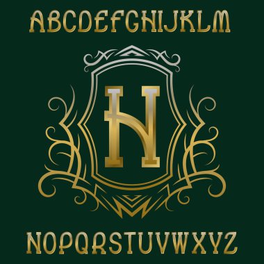 Çelenk ile kalkan altın ilk monogram şablonu. Zarif alfabesi ve logo tasarım öğeleri.