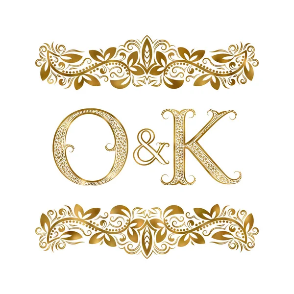 O and K vintage initials logo symbol. The letters are surrounded by ornamental elements. Wedding or business partners monogram in royal style. — Stock Vector