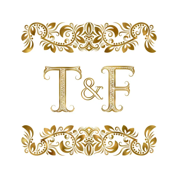 T y F vintage iniciales símbolo del logotipo. Las letras están rodeadas de elementos ornamentales. Boda o socios de negocios monograma en estilo real . — Vector de stock
