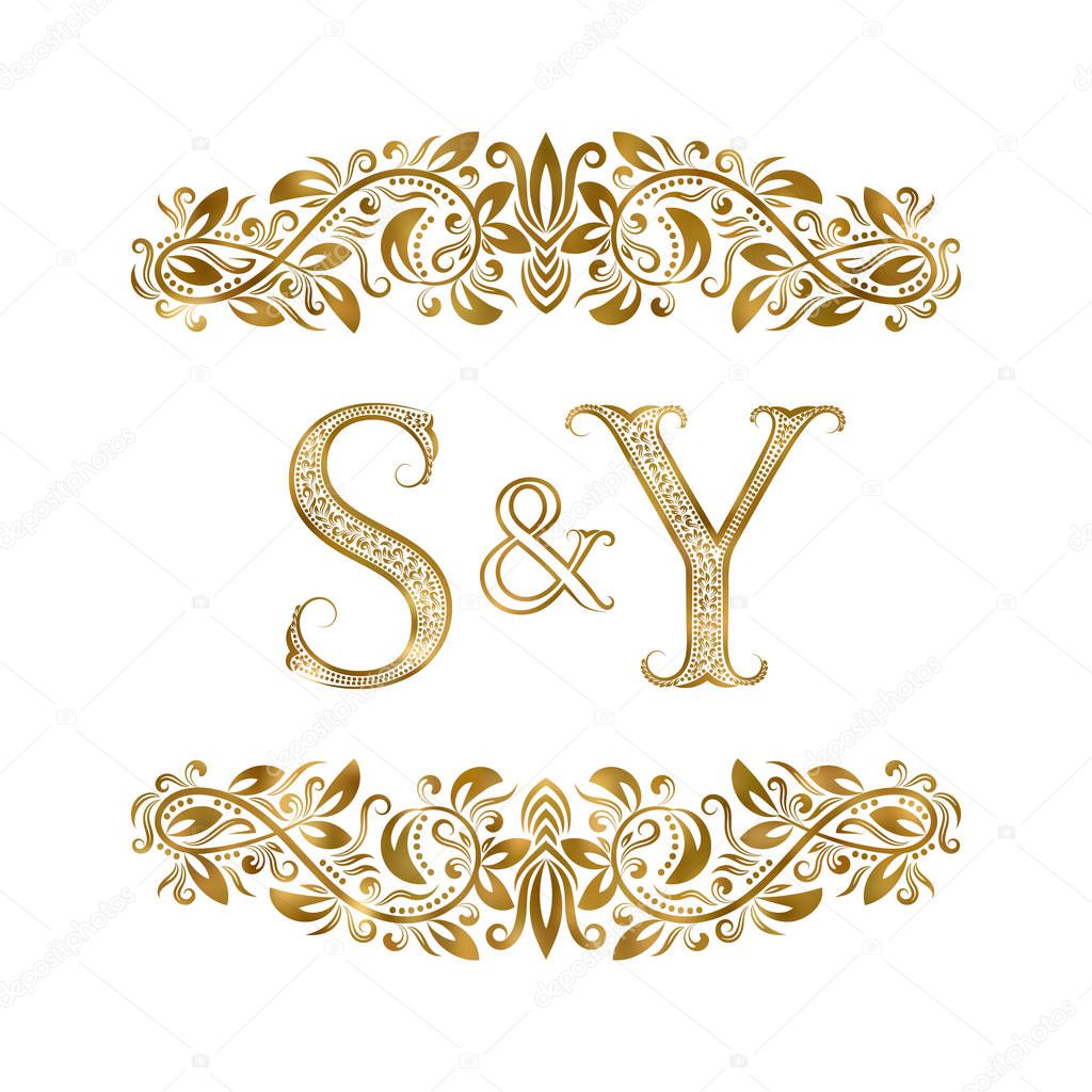 S and Y vintage initials logo symbol. The letters are surrounded by ornamental elements. Wedding or business partners monogram in royal style.