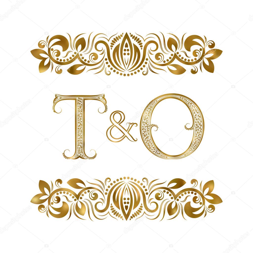 T and O vintage initials logo symbol. The letters are surrounded by ornamental elements. Wedding or business partners monogram in royal style.