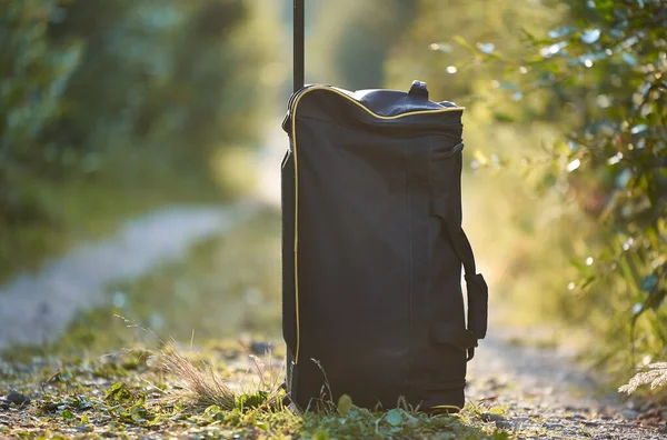 Horizontal Shot Travel Bag Standing Country Road Concept Travel Royalty Free Stock Images