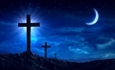 Silhouette of three crosses on a hill And night time clipart