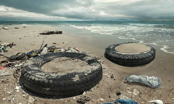 Car Tire Plastic Bottles Pollution Muddy Puddle Beach Environment Concept — Stock Photo, Image