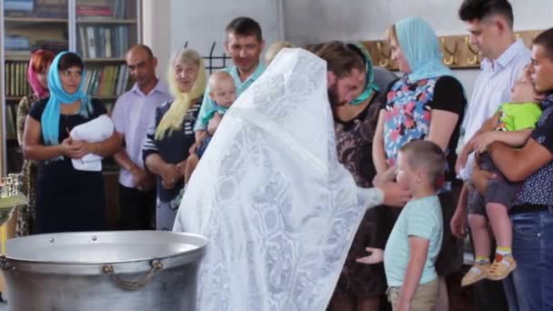 Russia, Novosibirsk, August 25, 2016. The children baptized in the Church — Stock Video