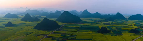 Panoramic view of small villages with Rapeseed flowers at Jinjif — Stock Photo, Image