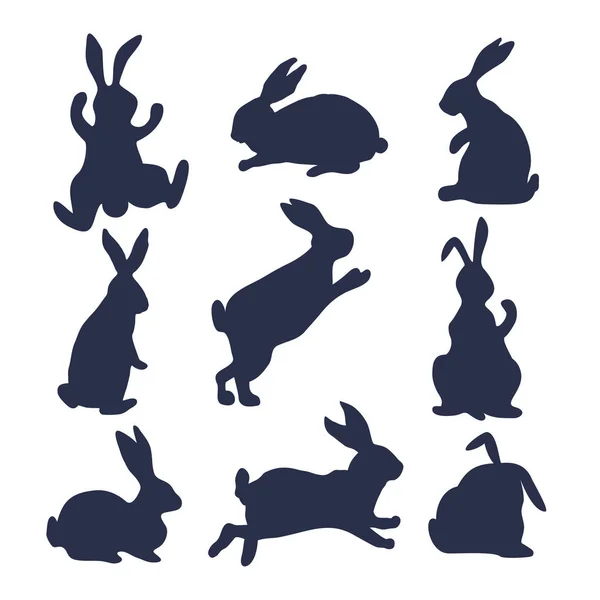 9 силуэтов кроликов — стоковый вектор