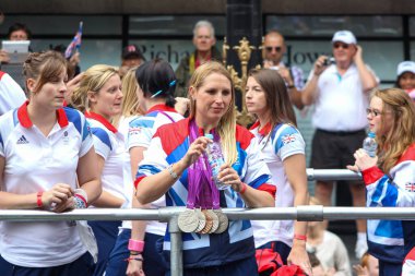 2012 Olympians during the 2012 British Olympic and Paralympic teams victory parade clipart
