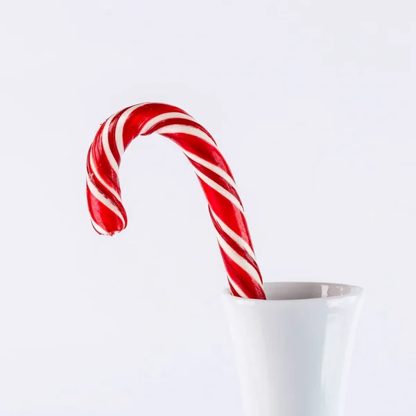 Christmas candy in a white vase — Stock Photo, Image