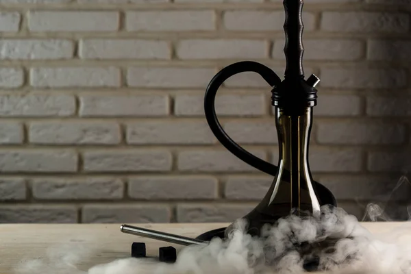 Hookah on white wooden table — Stock Photo, Image
