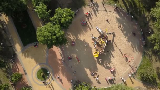 Childrens playground in the city park. Aerial view — Stock Video
