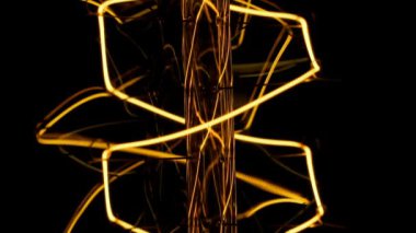 Edison ampul siyah bir arka plan. Bunları yakın çekim spiral