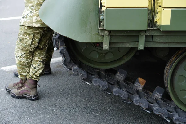 Elements of the running gear of a military vehicle. Background. Close-up