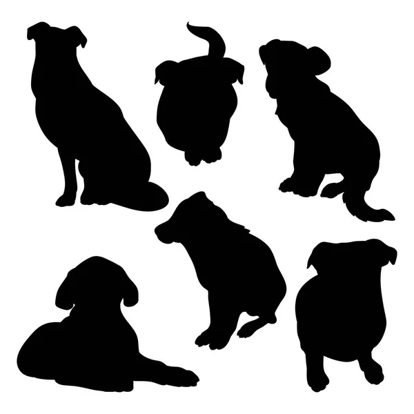 Black silhouettes of dogs on a white background — Stock Vector