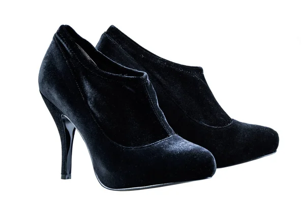 妇女的秋天脚踝靴子黑色鞋跟的高度平均在白色背景上. — 图库照片