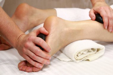 Stone foot massage, detail