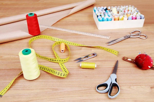 Sewing tools on the table. Sewing supplies. Seamstress Workplace
