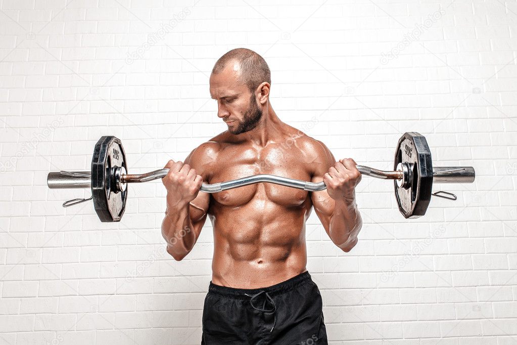 Strong man with weight bar