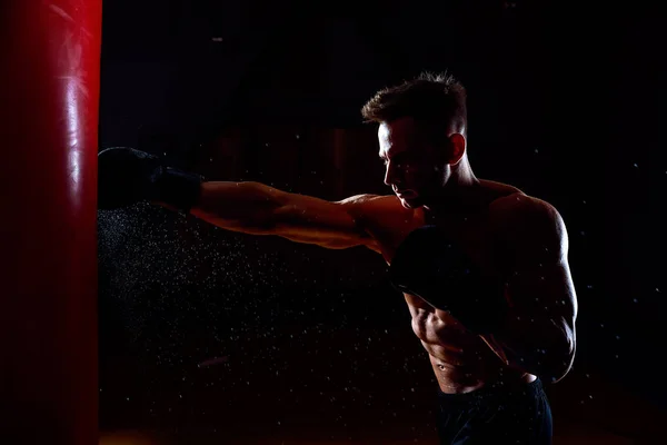 Boxer and punching bag — Stock Photo, Image