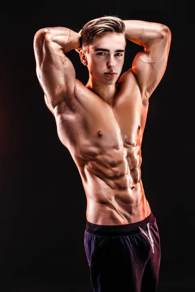 Strong man showing perfect abs, houlders, biceps, triceps and ch 35423240  Stock Photo at Vecteezy