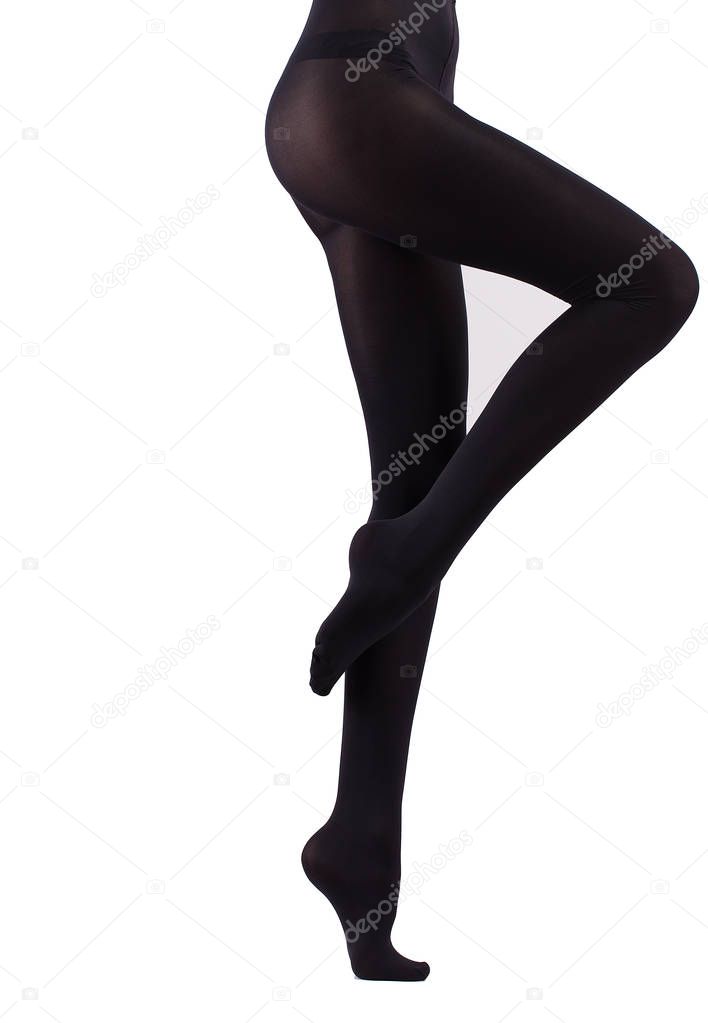 girl in black pantyhose. Isolated on white.