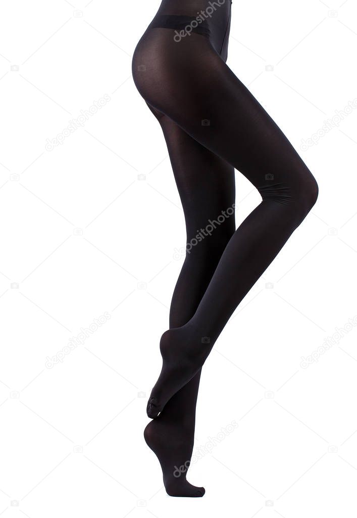 girl in black pantyhose. Isolated on white.