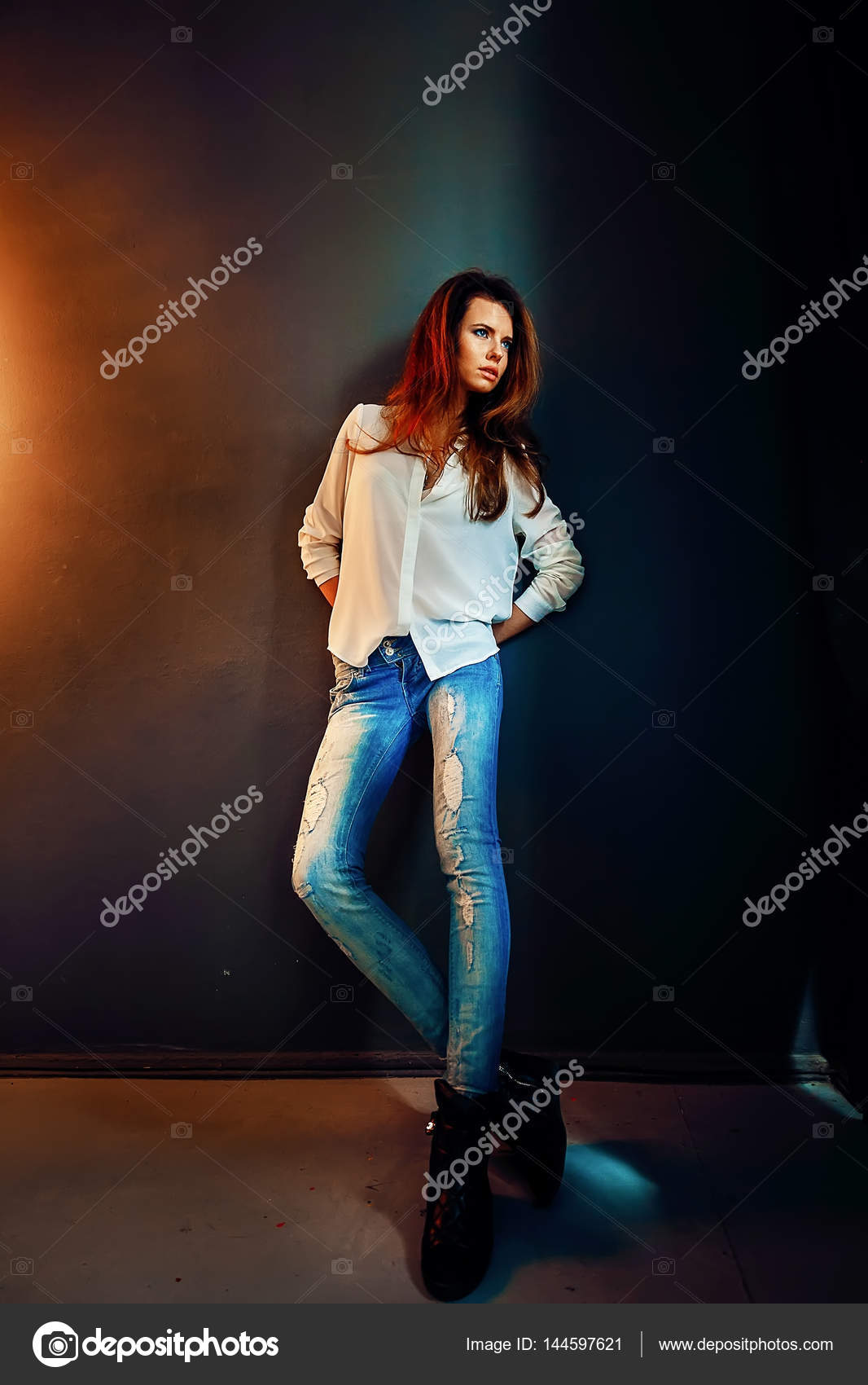 Beautiful Girl Standing Near The Dark Blue Wall In Darkness Stock Photo Image By C Zamuruev Beautiful Girl Standing Near The Dark Blue Wall In Darkness Stock Photo Image By C Zamuruev