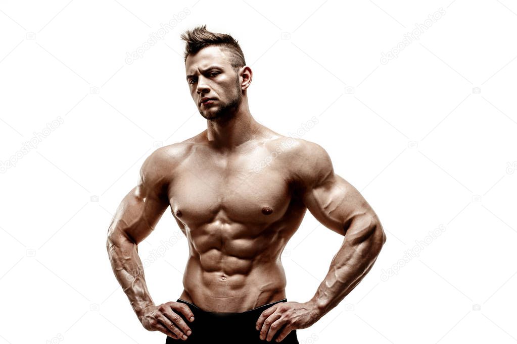 muscular super-high level handsome man with naked torso posing on white background