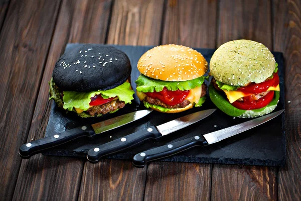 Tres deliciosas hamburguesas — Foto de Stock