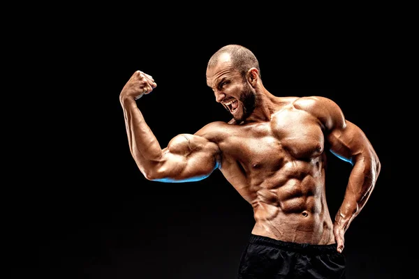 Strong bald bodybuilder with six pack. — Stock Photo, Image