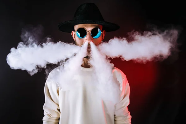 Stylish man puffing vapor — Stock Photo, Image