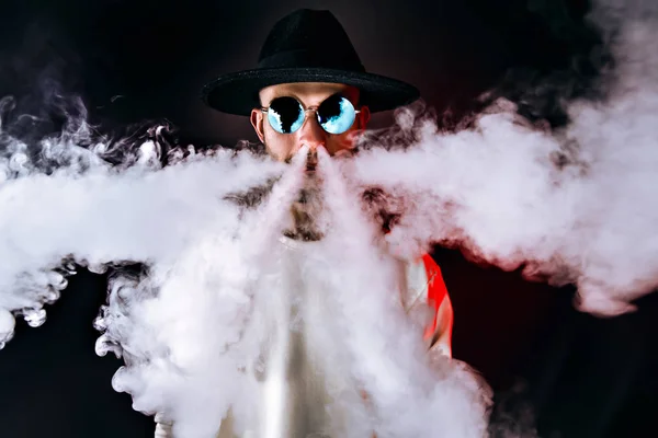 Stylish man puffing vapor — Stock Photo, Image