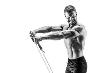 Kaslı adam çalışıyor.