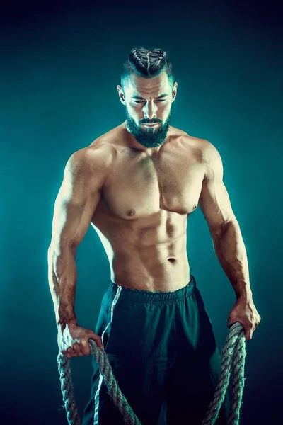 Man training with rope — Stock Photo, Image