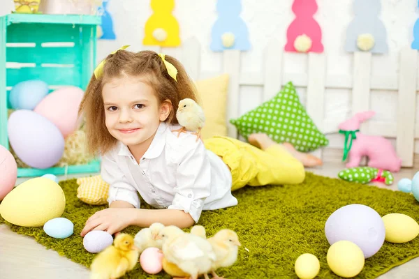 Content kid with ducks on lawn — Stock Photo, Image