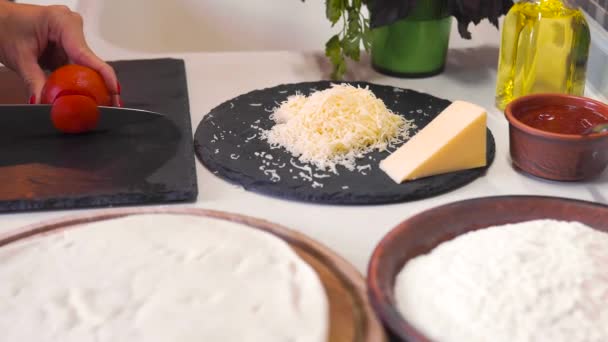 Close-up of a woman cutting vegetables — Stock Video