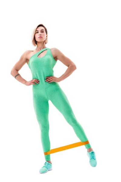 Vrouw fitness weerstandsbanden in studio silhouet geïsoleerd op witte achtergrond — Stockfoto