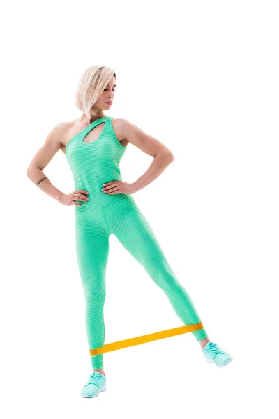 Vrouw fitness weerstandsbanden in studio silhouet geïsoleerd op witte achtergrond — Stockfoto