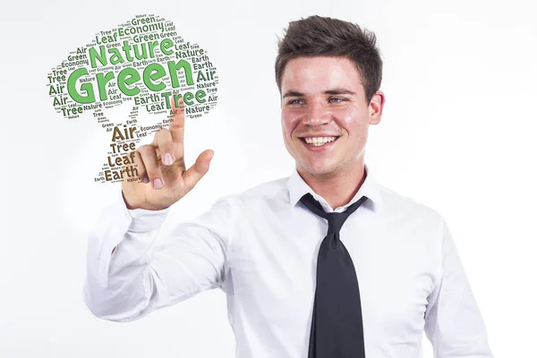 Árvore Verde - Jovem empresário tocando nuvem de palavras — Fotografia de Stock