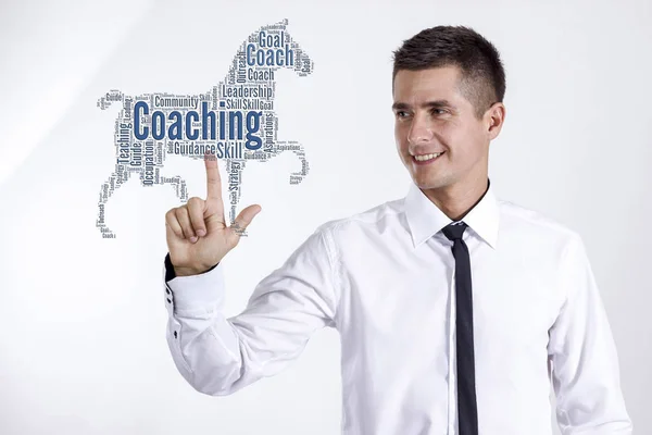 Coaching - Giovane imprenditore toccare parola nuvola — Foto Stock