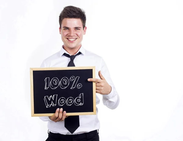 100% Madera - Joven hombre de negocios sonriente sosteniendo pizarra con te —  Fotos de Stock