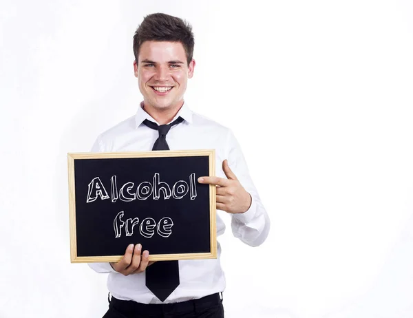 Sans alcool - Jeune homme d'affaires souriant tenant un tableau noir avec — Photo