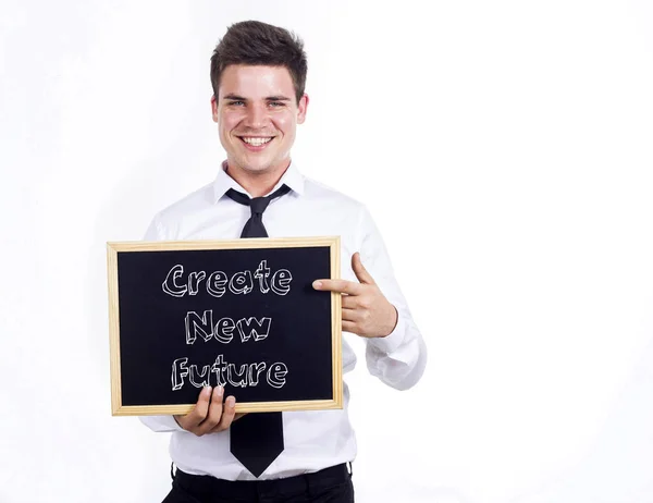 Vytvořit novou budoucnost - mladý, usměvavý obchodník drží tabuli — Stock fotografie