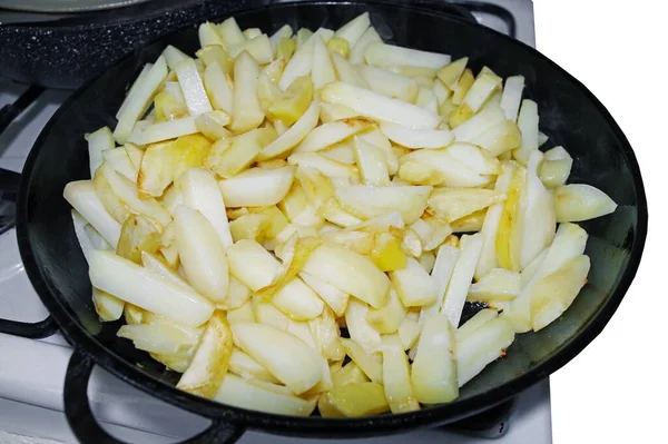 Fried potatoes on the iron frying pan