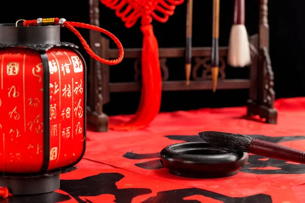 Spring Festival materials such as couplets, lanterns, pen and ink, and ingot
