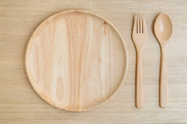 Vista dall'alto di forchetta e cucchiaio in legno — Foto Stock