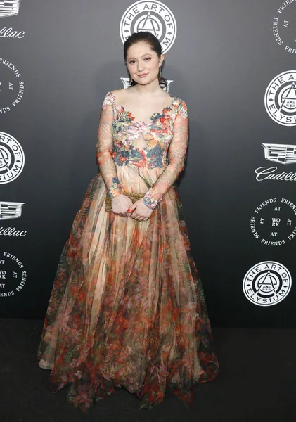 stock image actress Emma Kenney at the Art Of Elysium's 11th Annual Heaven Celebration held at the Barker Hangar in Santa Monica, USA on January 6, 2018.