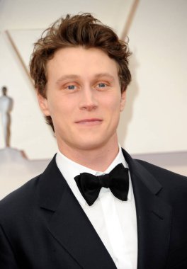 George Mackay, 9 Şubat 2020 'de Hollywood Dolby Tiyatrosu' nda düzenlenen 92. Akademi Ödülleri 'nde..