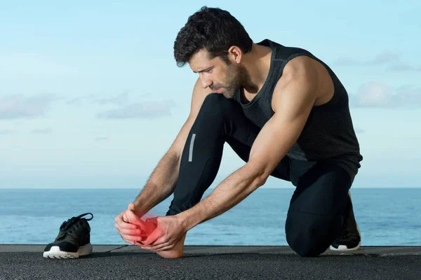 Athlete with foot injury — Stock Photo, Image