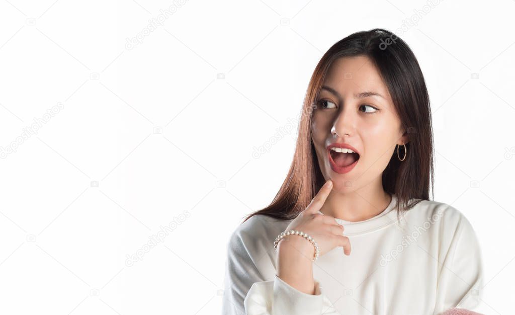 Attractive woman surprised on white background